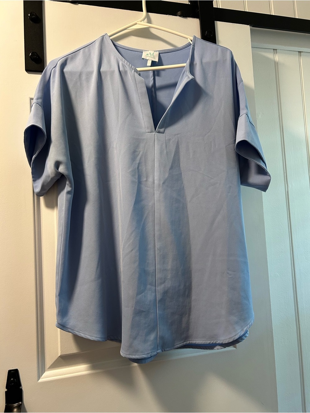 Shop the Mint Short Sleeve Light Blue  V-Neck Blouse